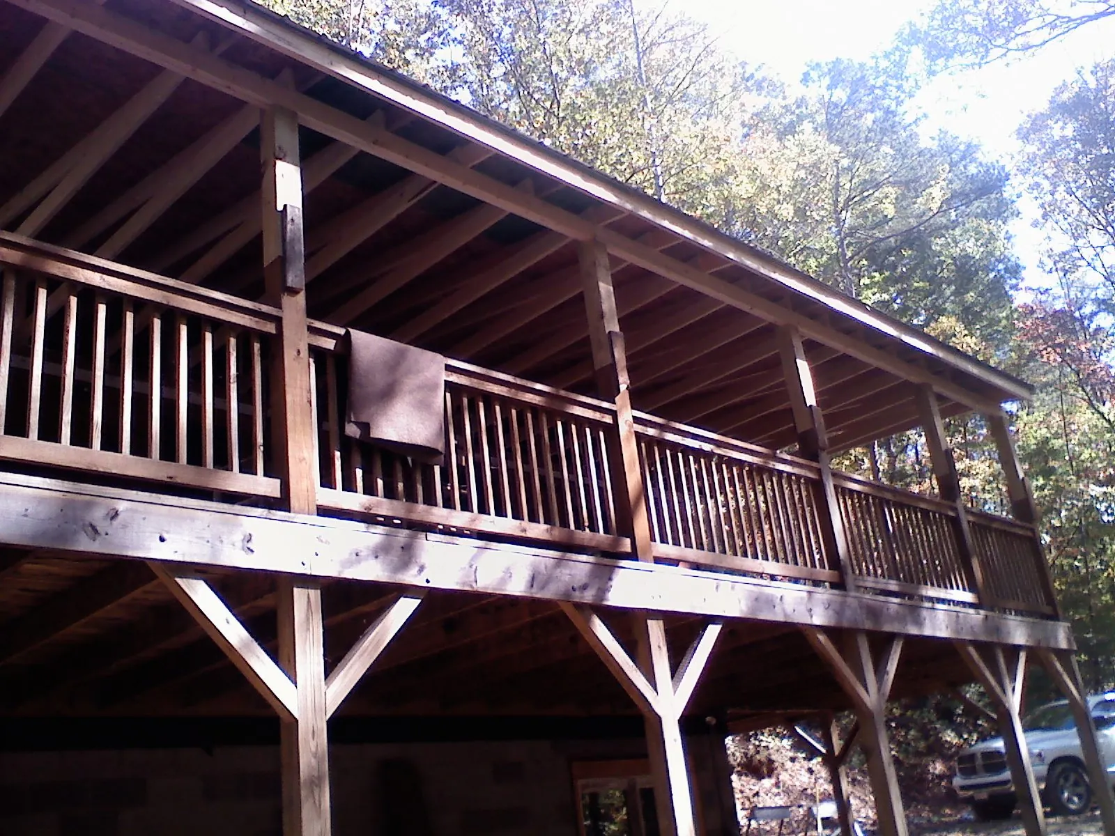 Timber framing under a new elevated porch and deck — Roof Leak Repair in Bethel Springs by Roofing Brothers
